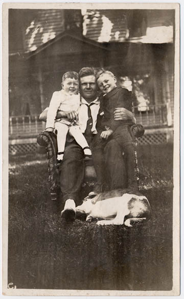 Elmer, Walter, Claude with family dog