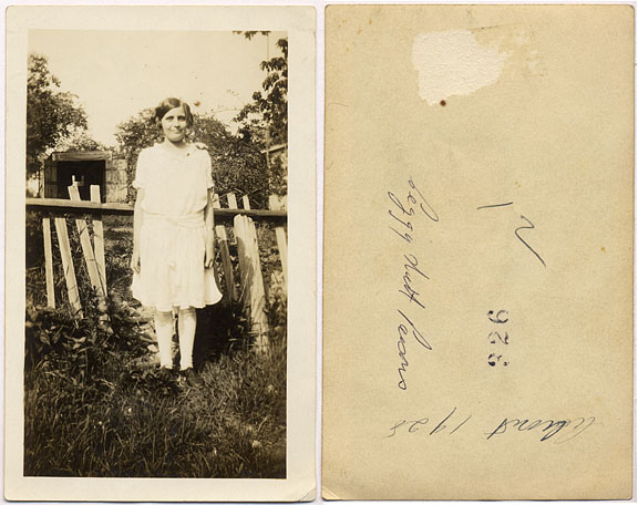 1928 Margaret Watt standing in the yard