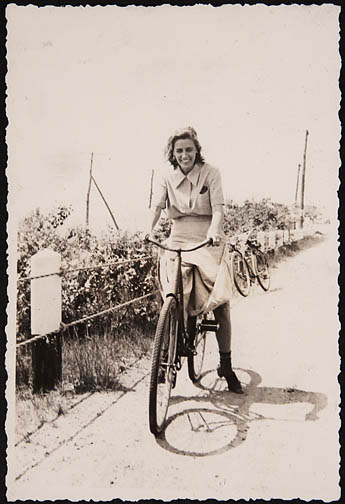 1935 Peg riding her bike at Lynn Beach