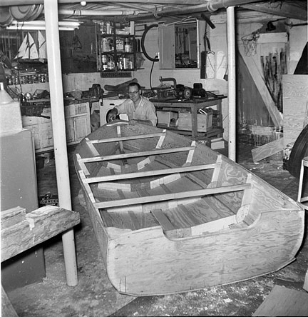 1958 James Jr. building motor boat