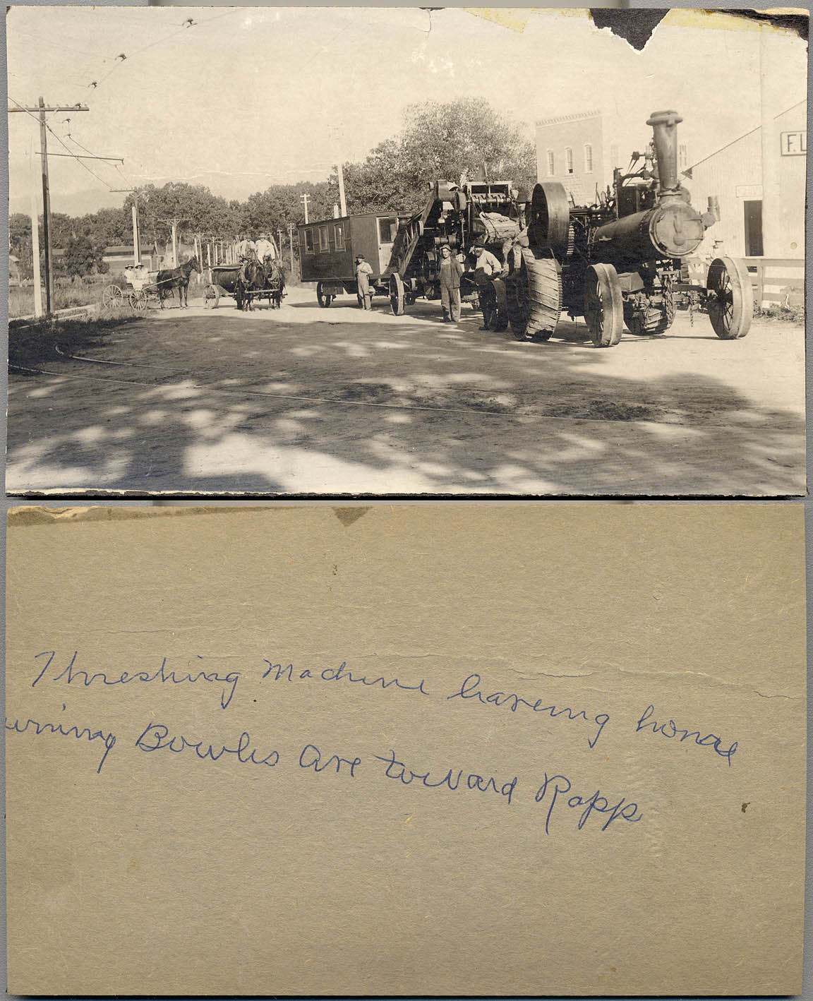 Around 1914, a wagon train with a threshing machine pulled by a Case 60 steam tractor followed by a water trailer, and horse and buggy with two ladies and their large hats, according to the caption, nears Bowles Avenue and Rapp in Littleton, Colorado.