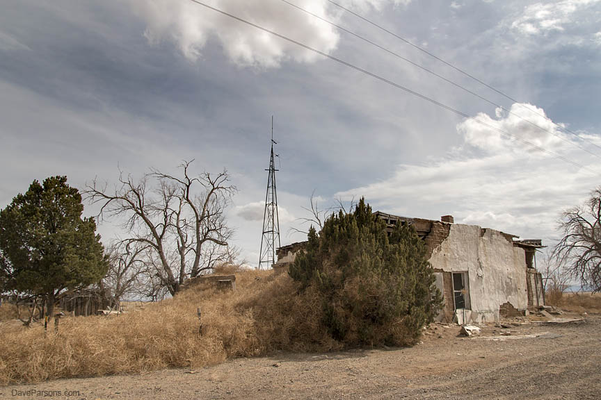 Tumbleweeds overrun an abandoned adobe building along Highway 350 outside Trinadad, Colorado.